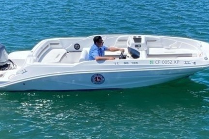 a small boat in a body of water