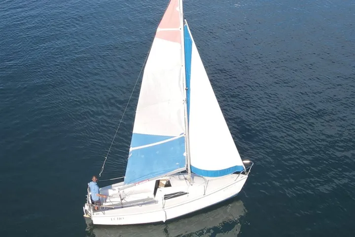 a small boat in a body of water