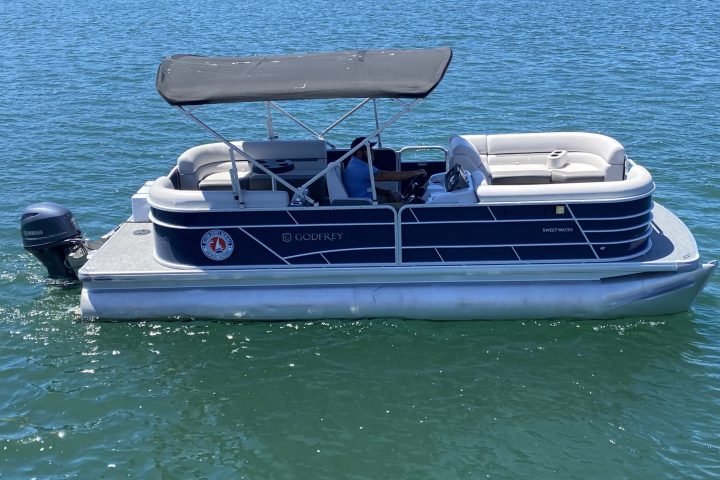 a small boat in a body of water
