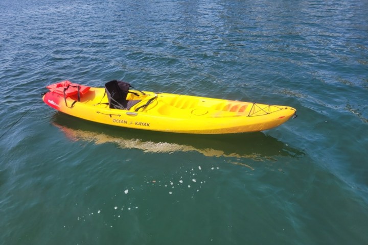 a small boat in a body of water