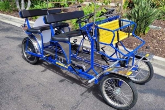 a bicycle parked on the side of a road
