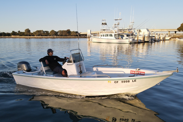 a small boat in a body of water