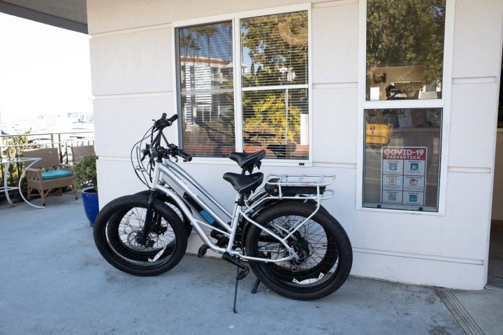 a motorcycle parked on the side of a building