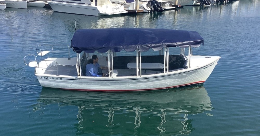 Duffy Powerboat w/ Sundeck Rental | Action Sports Rentals, San