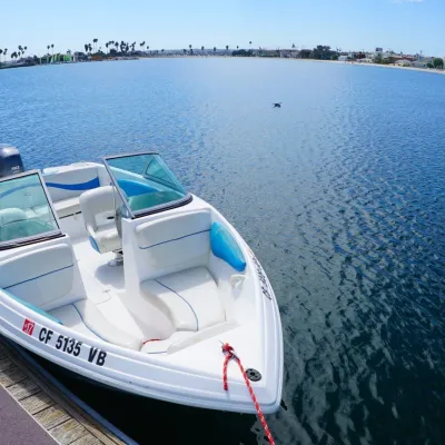 a boat parked next to a body of water