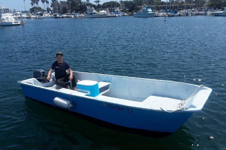 a small boat in a large body of water