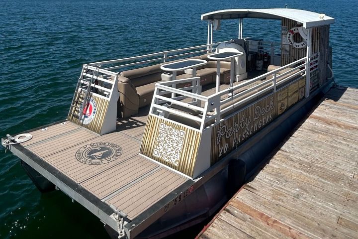 a wooden boat in a body of water