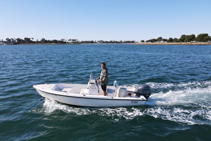 a small boat in a body of water