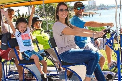 a group of people sitting posing for the camera